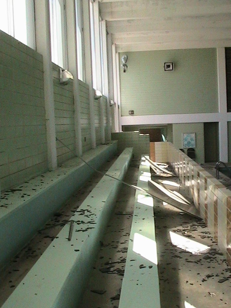 Interior area with broken glass and debris